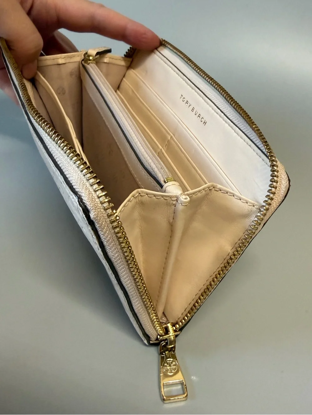 Tory Burch Leather Embossed Monogram zip wallet Off white